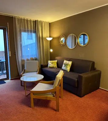 Ein Sitzbereich in der Unterkunft Lesura Ferien- Apartment