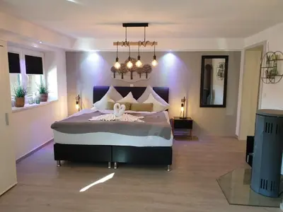 Ein Bett oder Betten in einem Zimmer der Unterkunft Eifel Dream Krausbuche