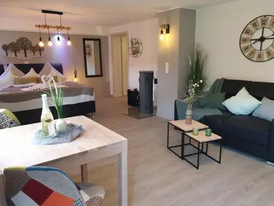 Ein Bett oder Betten in einem Zimmer der Unterkunft Eifel Dream Krausbuche