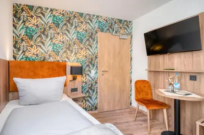 Ein Bett oder Betten in einem Zimmer der Unterkunft Haus Moselfranke