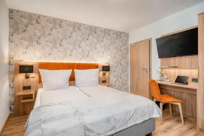 Ein Bett oder Betten in einem Zimmer der Unterkunft Haus Moselfranke