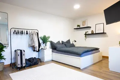 Ein Bett oder Betten in einem Zimmer der Unterkunft Schöne Ferienwohnung im Simmern