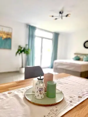 Ein Bett oder Betten in einem Zimmer der Unterkunft Apartment mit Stadtblick