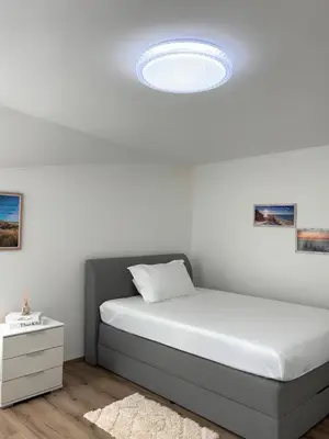 Ein Bett oder Betten in einem Zimmer der Unterkunft Ferienwohnung in Gerolstein Zentrum 2