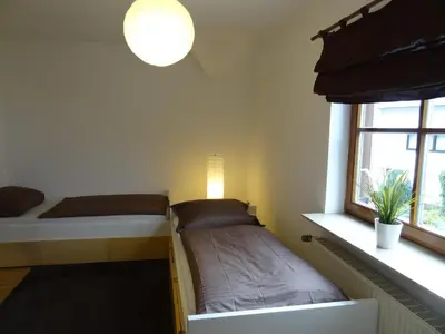Ein Bett oder Betten in einem Zimmer der Unterkunft Ferienhaus van Vliet