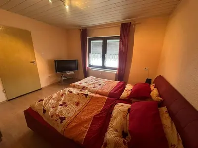Ein Bett oder Betten in einem Zimmer der Unterkunft Apartment in Neuwied