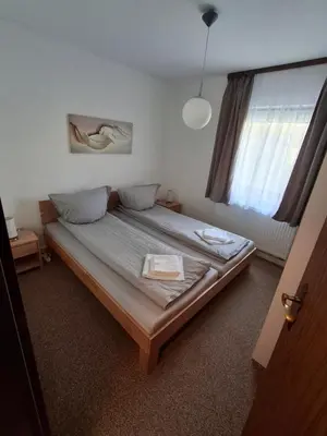 Ein Bett oder Betten in einem Zimmer der Unterkunft Ferienwohnung Natalia