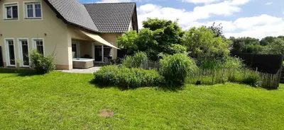 Ein Garten an der Unterkunft Eifel Dream Casa29