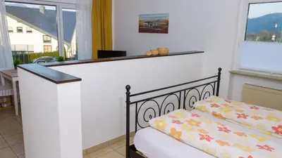 Ein Bett oder Betten in einem Zimmer der Unterkunft Weingut Roth