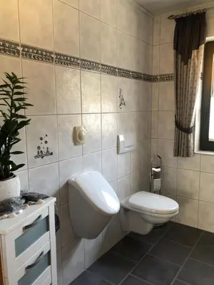 Ein Badezimmer in der Unterkunft Zwei gepflegte Gästezimmer mit eigenem Bad