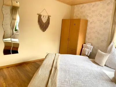 Ein Bett oder Betten in einem Zimmer der Unterkunft Zwei gepflegte Gästezimmer mit eigenem Bad