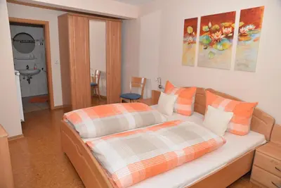 Ein Bett oder Betten in einem Zimmer der Unterkunft Pension Basten