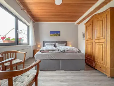Ein Bett oder Betten in einem Zimmer der Unterkunft Weingut HermesLex