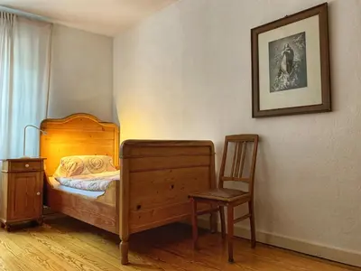 Ein Bett oder Betten in einem Zimmer der Unterkunft Kleine Villa Wildstein