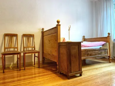 Ein Bett oder Betten in einem Zimmer der Unterkunft Kleine Villa Wildstein