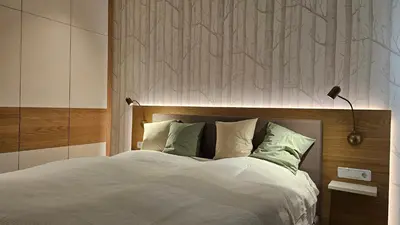 Ein Bett oder Betten in einem Zimmer der Unterkunft Landhaus Wald und See