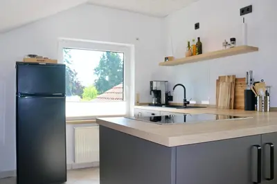 Küche/Küchenzeile in der Unterkunft EifelBleibe, Ferienwohnungen