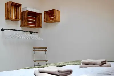 Ein Bett oder Betten in einem Zimmer der Unterkunft EifelBleibe, Ferienwohnungen