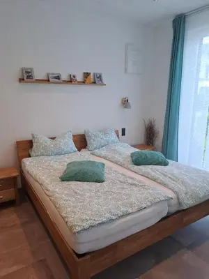 Ein Bett oder Betten in einem Zimmer der Unterkunft Fewo Merten