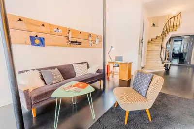 Ein Sitzbereich in der Unterkunft SOON APT Nr 1