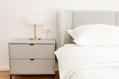 Ein Bett oder Betten in einem Zimmer der Unterkunft Ferienhaus Arina