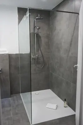 Ein Badezimmer in der Unterkunft Hain Estate Appartements