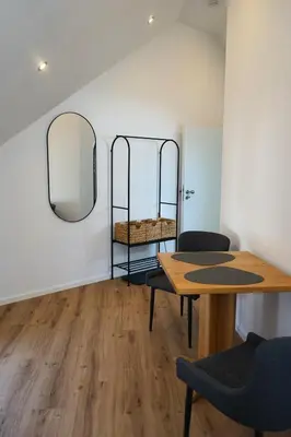 Ein Bett oder Betten in einem Zimmer der Unterkunft Hain Estate Appartements