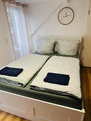 Ein Bett oder Betten in einem Zimmer der Unterkunft Balkonwohnung in Moselnähe