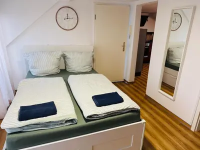 Ein Bett oder Betten in einem Zimmer der Unterkunft Balkonwohnung in Moselnähe