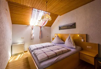 Ein Bett oder Betten in einem Zimmer der Unterkunft Ferienhaus 