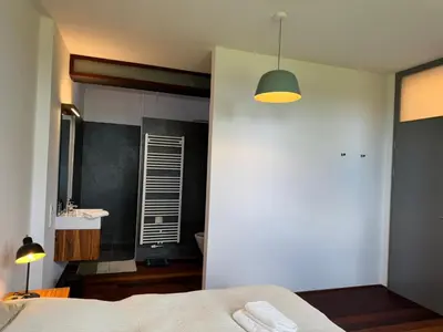 Ein Bett oder Betten in einem Zimmer der Unterkunft Ferienwohnung Faulhauer