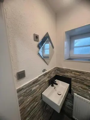 Ein Badezimmer in der Unterkunft Gemütliche EG-FeWo im Haus zur Vulkaneifel in Brohl