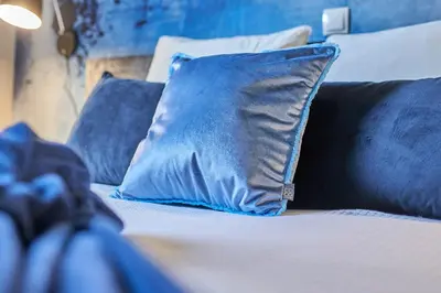 Ein Bett oder Betten in einem Zimmer der Unterkunft Ferienwohnung Mila EG