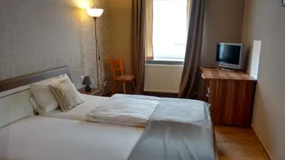 Ein Bett oder Betten in einem Zimmer der Unterkunft Landgasthaus Oberbillig