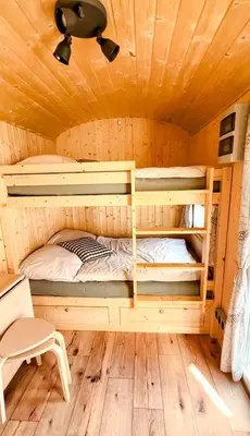 Ein Bett oder Betten in einem Zimmer der Unterkunft Wonderful Tiny House Perfect for a Unique Glamping Experience in Germany