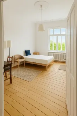 Ein Bett oder Betten in einem Zimmer der Unterkunft Ruhig in zentraler Lage mit Villen-Flair