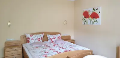 Ein Bett oder Betten in einem Zimmer der Unterkunft Serwazi-Zenzen