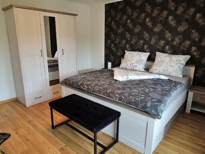 Ein Bett oder Betten in einem Zimmer der Unterkunft Panoramablick