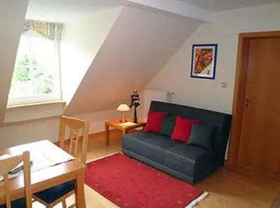 Ein Sitzbereich in der Unterkunft Wein- u. Gästehaus St. Maximin