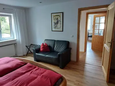 Ein Sitzbereich in der Unterkunft Ferienwohnung an der Traumschleife