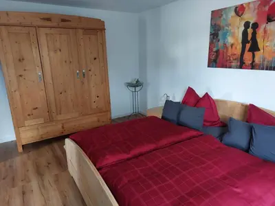 Ein Bett oder Betten in einem Zimmer der Unterkunft Ferienwohnung an der Traumschleife