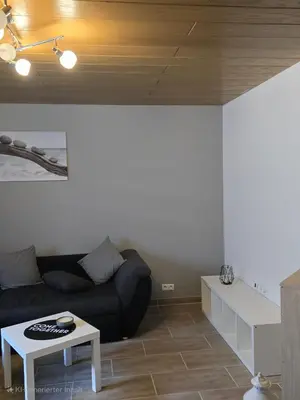 Ein Sitzbereich in der Unterkunft Ferienwohnung an Rhein und Mosel