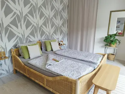 Ein Bett oder Betten in einem Zimmer der Unterkunft Ferienwohnung Moselherz