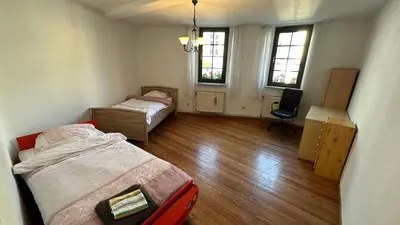 Ein Bett oder Betten in einem Zimmer der Unterkunft Idar-Oberstein Apartment FeWo 2 ZKB 4 Personen