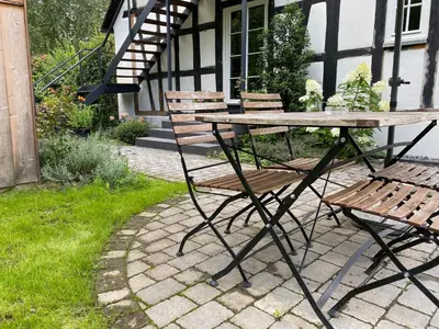 Ein Garten an der Unterkunft Weingut Bindges - Apartment Rosenhof