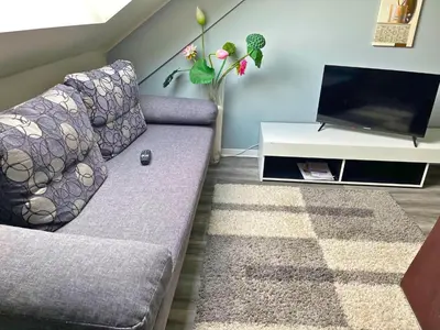 Ein Sitzbereich in der Unterkunft Apartment in Pellingen near Moselle Valley