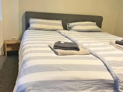 Ein Bett oder Betten in einem Zimmer der Unterkunft Apartment in Trier with parking