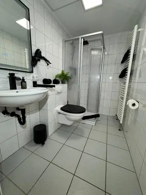 Ein Badezimmer in der Unterkunft Moselgold Apartment