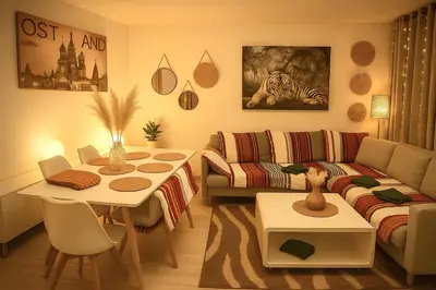 Ein Sitzbereich in der Unterkunft StadtLicht Residence l Panorama Balkon
