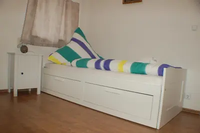 Ein Bett oder Betten in einem Zimmer der Unterkunft Wacholder am Waldsee 1